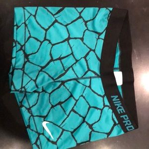 Real and black Nike Pro spandex shorts